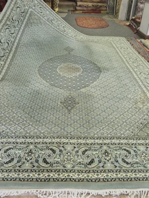 Tabriz rug History Gracious green Tabriz