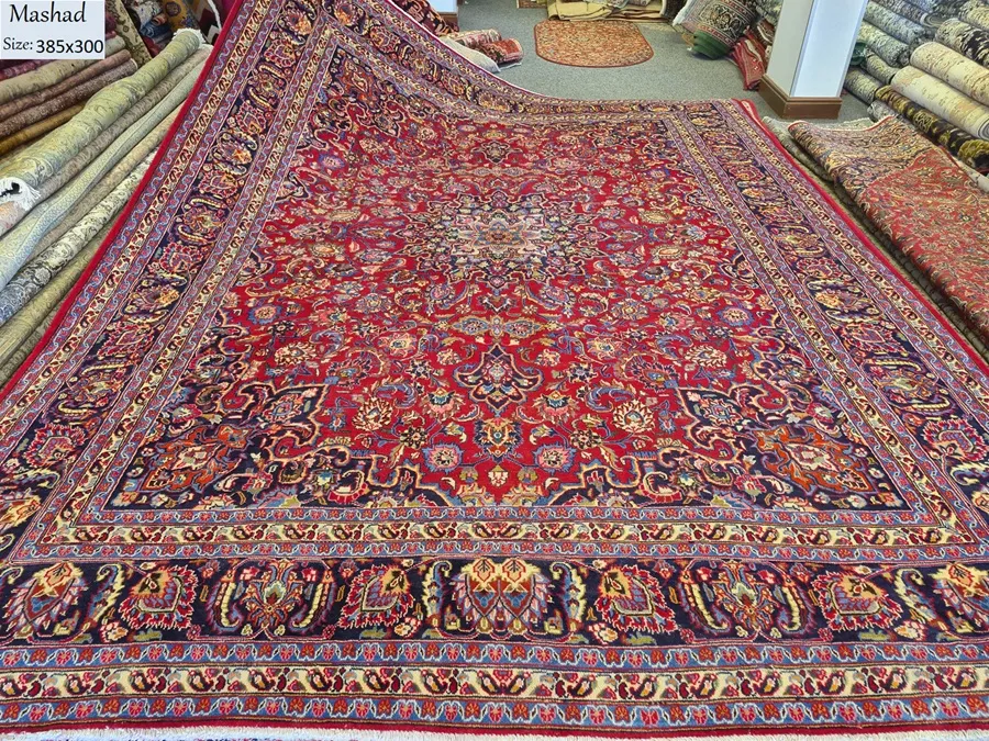 persian mashad carpet size 385x300 cm hand knotted by natural wool vegetable dye. r15 000 valuation certificate 1